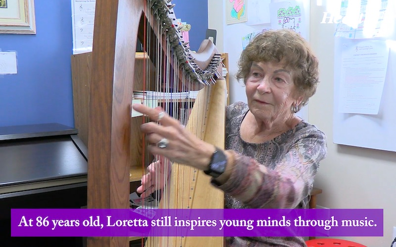 Loretta Fox Playing Harp